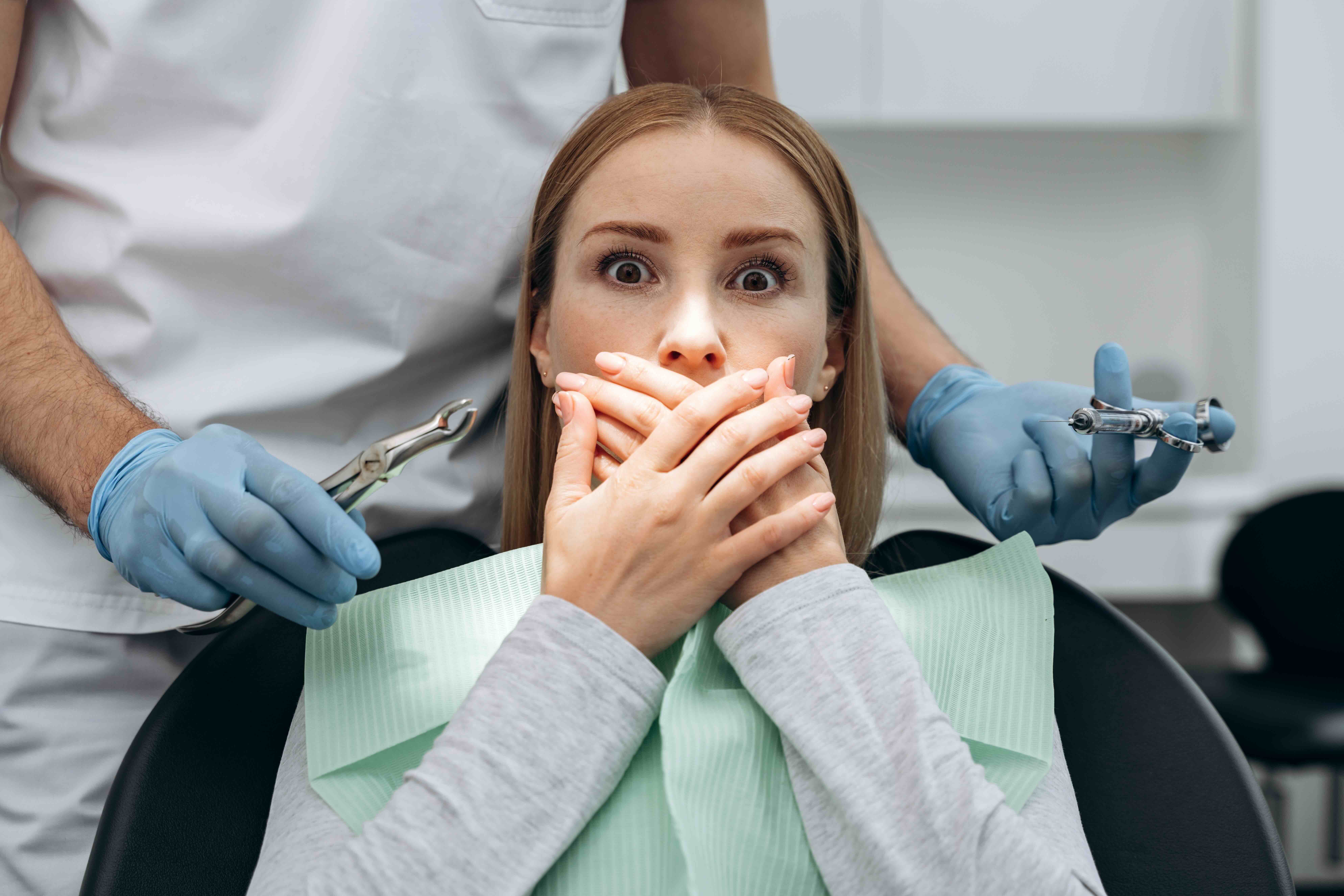 A patient experiencing dental anxiety. Atlanta Dental Spa is here to help.
